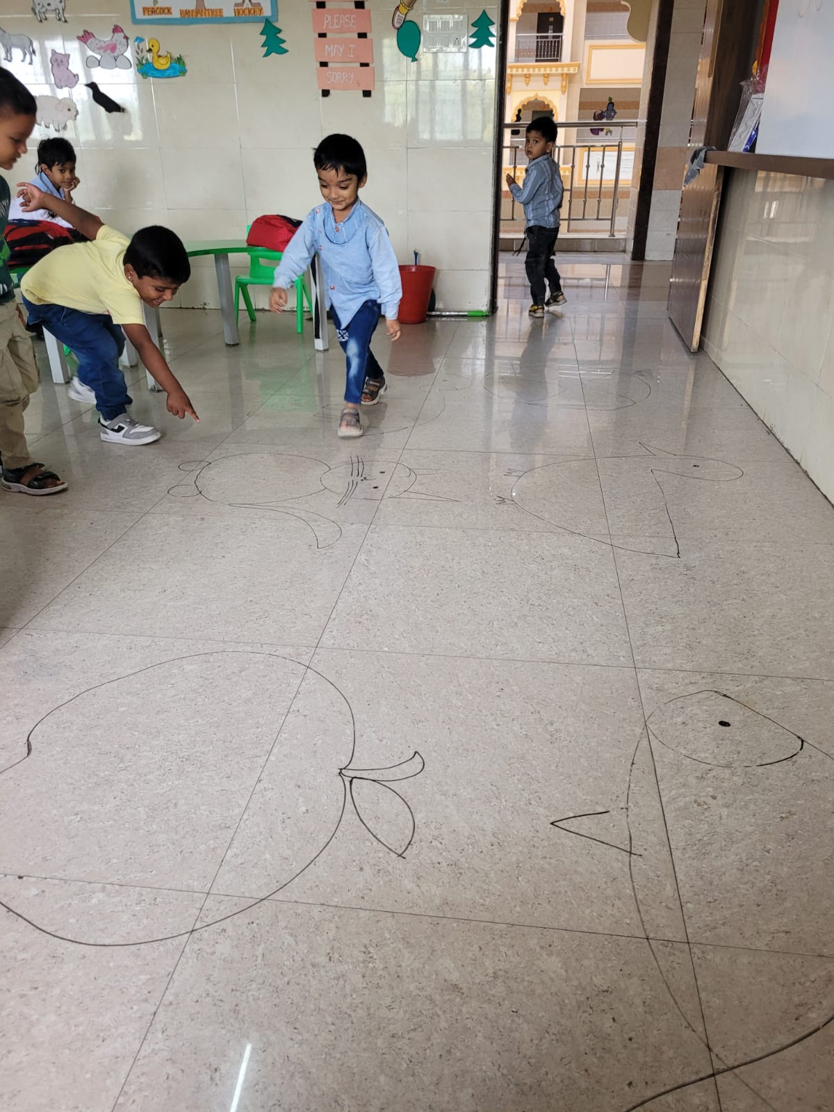 LKG Kids Enjoy Letter Recognition and Jumping Fun